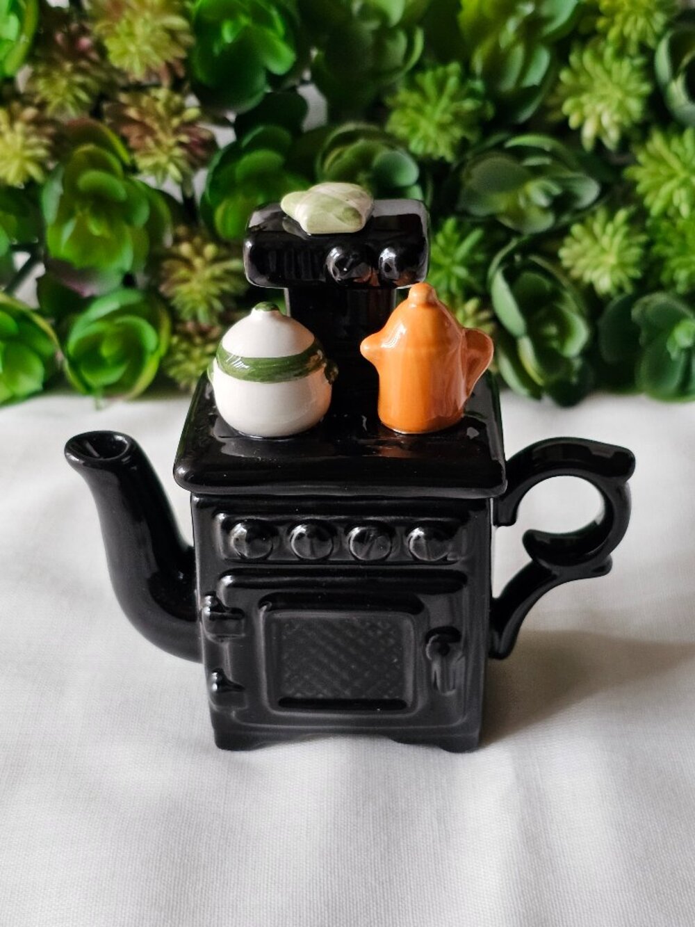 World Bazaar Inc. ceramic black miniature vintage oven with teapots